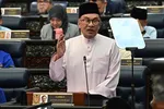 Thủ tướng kiêm Bộ trưởng Tài chính Malaysia Anwar Ibrahim phát biểu tại Quốc hội, Kuala Lumpur, Malaysia, Thứ Sáu, ngày 13/10/2023. (Bộ Thông tin Malaysia qua AP)
