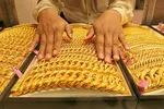 Giá vàng thế giới 22/12: Tăng sau dữ liệu kinh tế Mỹ thúc đẩy triển vọng cắt giảm lãi suất của Fed