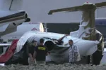 Các quan chức cho biết một trong những chiếc máy bay phản lực đã chệch khỏi đường băng và đâm vào một chiếc khác trên đất tư nhân. 