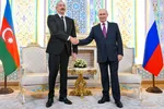 Tổng thống Azerbaijan Ilham Aliyev (trái) và Tổng thống Nga Vladimir Putin trong một cuộc họp tại Tajikistan. Ảnh: Sputnik