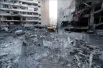 Tòa nhà bị phá hủy sau cuộc không kích của Israel tại Beirut, Liban. Ảnh: THX/TTXVN