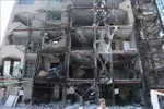 Toà nhà ở Tehran, Iran bị phá huỷ trong vụ không kích của lực lượng Mỹ - Israel, ngày 14-4. Ảnh: THX/TTXVN.