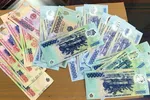 Chủ động ngăn chặn tiêu thụ tiền giả dịp cuối năm
