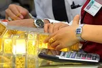 Vàng SJC vượt 62 triệu đồng/lượng