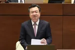 Bộ trưởng Nguyễn Thanh Nghị đang trả lời chất vấn về lĩnh vực xây dựng