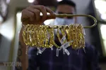 Vàng trang sức được bày bán tại tiệm kim hoàn ở Cairo, Ai Cập. (Ảnh: THX/TTXVN)