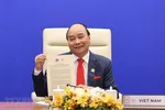 Thủ tướng Nguyễn Xuân Phúc và lãnh đạo các nền kinh tế thành viên thông qua "Tầm nhìn APEC Putrajaya 2040". (Ảnh: Thống Nhất/TTXVN)