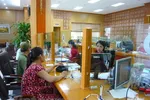 Giao dịch tại Agribank. (Ảnh: Thúy Hà/Vietnam+)