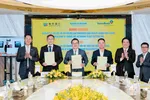 Lãnh đạo các bên ký kết Thư ủy nhiệm khoản vay hợp vốn quốc tế trị giá 100 triệu USD.