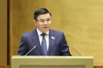 Bộ trưởng Bộ Công thương Lê Mạnh Hùng trình dự án Luật sửa đổi, bổ sung một số điều của Luật Thương mại, Luật Cạnh tranh, Luật Quản lý ngoại thương, Luật Bảo vệ quyền lợi người tiêu dùng. Ảnh: QUANG PHÚC