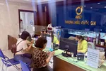 Giao dịch vàng tại Công ty SJC. Ảnh: NHUNG NGUYỄN