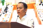 Bộ trưởng Bộ Tư pháp Hoàng Thanh Tùng phát biểu tại hội nghị. Ảnh: CẨM HÀ