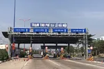 Trạm thu phí xa lộ Hà Nội bắt đầu thu phí từ ngày 1-4. Anh QUỐC HÙNG 