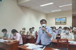 Ông Nguyễn Cao Mỹ (Đại diện Cục thuế Thành phố) phát biểu các vướng mắc về nghĩa vụ tài chính tại các dự án.