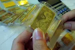 Khoảng cách giữa vàng trong nước và vàng thế giới ngày càng nới rộng.