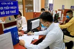 Gia hạn thời hạn nộp thuế thu nhập doanh nghiệp tạm nộp quý I, quý II-2022. Ảnh: VGP