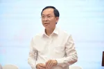 Phó Thống đốc Ngân hàng Nhà nước Việt Nam Đào Minh Tú trả lời báo chí về điều hành tài chính-tiền tệ tại buổi họp báo. Ảnh: VGP
