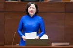 Thống đốc Ngân hàng Nhà nước Nguyễn Thị Hồng trả lời chất vấn tại phiên họp sáng 11-11 (Ảnh: Cổng thông tin điện tử Quốc hội).