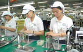 本市新順出口加工區的Nidec Tosok公司生產電子零配件一瞥。