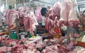 豬肉價格呈下降趨勢。(圖源:H.Linh)