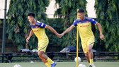 Anh Đức và Quế Ngọc Hải đang bình phục chấn thương khá nhanh và đã ra sân tập chiều 24-9. Ảnh: MINH HOÀNG