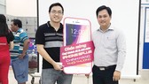 Khách hàng trúng thưởng Iphone 8 plus tại siêu thị Co.opmart Nguyễn Ảnh Thủ TPHCM