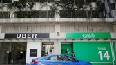 新加坡反壟斷機構因為打車公司Uber與Grab的合併交易對兩家公司總計罰款1300萬新元(約合950萬美元)。(示意圖源:互聯網)