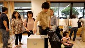 日本民眾對2019年日本參議院選舉進行投票。(圖源:路透社)