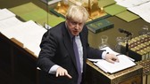 英首相鮑里斯‧約翰遜在議會下院發言。(圖源:新華社)