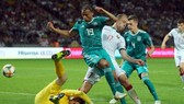 Leroy Sane (19) trong diện mạo mới đã tỏa sáng giúp tuyển Đức chiến thắng. Ảnh: Getty Images
