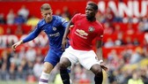 HLV Ole Gunnar Solskjaer tin Paul Pogba (phải) ở lại và sẽ tỏa sáng trong mùa này. Ảnh: Getty Images