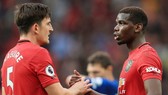 Trung vệ Harry Maguire (trái) và tiền vệ Paul Pogba đều là người đắt giá nhất trong vị trí của mình. Ảnh: Getty Images