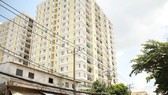 Tổ chức tháo dỡ phần xây dựng sai phép của chung cư Khang Gia