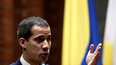 Juan Guaido phát biểu tại một hội nghị ở Đại học Công giáo Andres Bello tại Caracas, Venezuela hôm 24-5. Ảnh: REUTERS