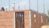 Quyết liệt giải quyết vi phạm trật tự xây dựng
