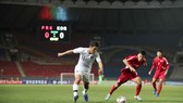 Hàn Quốc (áo trắng) trong trận hòa 0 - 0 với chủ nhà CHDCND Triều Tiên. Ảnh: FIFA