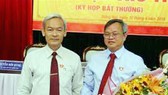Ông Cao Tiến Dũng (phải). Ảnh: Sỹ Tuyên/TTXVN