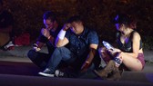 Những người may mắn sống sót. Ảnh: Los Angeles Times
