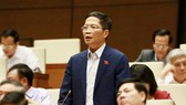 Bộ trưởng Bộ Công thương Trần Tuấn Anh trả lời chất vấn trước Quốc hội, ngày 31-10-2018.