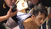 Người đàn ông ngáo đá cầm súng giả gây loạn ở sân bay Tân Sơn Nhất