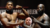 Anthony Joshua (trái) sẵn sàng cho trận thăng knock-out thứ 20