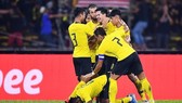 Niềm vui của các cầu thủ Malaysia khi ngược dòng giành 3 điểm trước Thái Lan. Ảnh: FAM