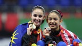 Hoa khôi TDDC Farah Ann (trái) thi đấu ấn tượng tại SEA Games 30. Ảnh: KHƯƠNG DUY