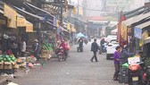 Cảnh sát hình sự Hà Nội đang xác minh nghi án nổ súng cướp tiền ở chợ Long Biên