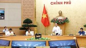 Thủ tướng chủ trì cuộc họp về chống dịch Covid-19 ngày 29-7. Ảnh: QUANG PHÚC