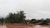 The Xepian-Xe Nam Noy hydropower dam collapsed at 20:00 on July 23, releasing 5 billion cu.m of water which caused flash flooding in 10 villages in lower areas and completely isolated Sanamxay district. (Source: KPL)