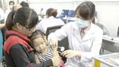 Vaccination can help reduce the rate of infection especially amongst kids (Photo: SGGP)