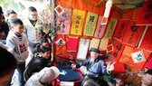 The annual Spring Calligraphy Festival, underway at Van Mieu – Quoc Tu Giam from February 9-25, is part of a series of events in Hanoi to celebrate Tet festival, the Vietnamese New Year. Illustrative image. (Photo: ANTD)