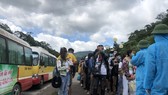 After performing relevant procedures, Laotian students are sent to isolated areas