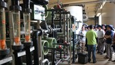Cán bộ, công chức phụ trách lĩnh vực môi trường 15 phường ở quận 4, TPHCM tìm hiểu về công nghệ và quy trình vận hành xử lý nước rỉ rác tại Công ty VWS